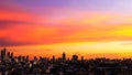 Top view bangkok city buildings sunset twilight orange sky see the beautiful purple nature background.