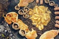 Top view of barbecue grill with various kinds of meat with potato for party. Royalty Free Stock Photo
