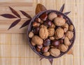 Top view of a basket full of chestnuts, walnuts, hazelnuts, almonds Royalty Free Stock Photo