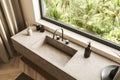 Top view of bathroom interior with sink and panoramic window Royalty Free Stock Photo