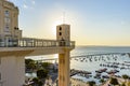 Top view of the bay of All Saints, Lacerda elevator and the harbor pier with its boats during the sunset Royalty Free Stock Photo