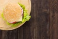 Top view bbq hamburger on the wooden background Royalty Free Stock Photo