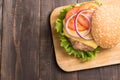 Top view bbq hamburger on the wooden background Royalty Free Stock Photo
