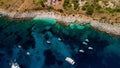 Top view of a beach in Scopello, Sicily. Boats are sailing on the azure water near the beach