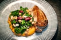 Top view Bean Salad with red beans, chick peas, cannellini beans, kale, cottage cheese, roast chicken