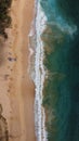 Top view of beautiful beach. Aerial drone shot of turquoise sea water at the beach - space for text. Hawaiian seaside beach with Royalty Free Stock Photo