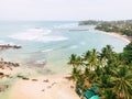 Top view of beautiful beach and Mirisa Sri Lanka. Aerial drone long shot