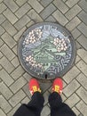 Top view of a beautiful decorated Manhole cover of Osaka Castle in Osaka