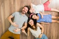 High angle of a dad, mom and little kids Royalty Free Stock Photo