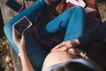 Top view of beautiful pregnant and her husband touching the tummy and looking ultrasound image. Concept of pregnancy, health care Royalty Free Stock Photo