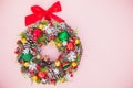 Top view Beautiful traditional bright Christmas wreath decorated with pine cones, spruce branches,berries, balls, stars and Royalty Free Stock Photo