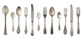 Top view of beautiful vintage silver knifes, spoons and forks  isolated on white background. Silverware Royalty Free Stock Photo