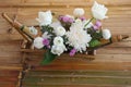 Top view beautiful white flower decoration placed on bamboo table