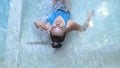 Top of view of beautiful young woman relaxes in a hydromassage jacuzzi, in swimming pool. Concept: spa procedures, body Royalty Free Stock Photo