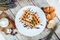 Belgian waffles poured ice cream chocolate syrup Royalty Free Stock Photo