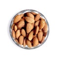 Top View of big raw peeled almonds in a Glass bowl isolated on white background. Royalty Free Stock Photo