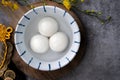Top view of big tangyuan yuanxiao in a bowl on gray background for lunar new year food