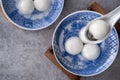 Top view of big tangyuan yuanxiao in a bowl on gray background for lunar new year food