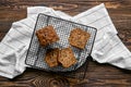 Top view of biscuit cake with walnut on baking grid Royalty Free Stock Photo