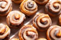 Top view of bite size cinnamon swirl rolls in a plastic tray