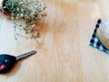 Top view with black car key, dry flower and glass of cold espresso coffee with ice on the wooden table background Royalty Free Stock Photo