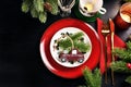 Top view of black Christmas table with red white green table setting and copy space Royalty Free Stock Photo