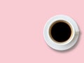 Top view of Black coffee in white cup isolated on the pink pastel  background. Royalty Free Stock Photo