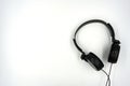 Black color headphone over white background Royalty Free Stock Photo