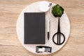 Top view black notebook with office stationery on wooden table with copy space.student stuff on desk.education concept
