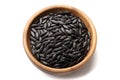 top view black sunflower seeds in a wooden bowl on a white background, created by Generative AI Royalty Free Stock Photo