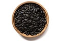 top view black sunflower seeds in a wooden bowl on a white background, created by Generative AI Royalty Free Stock Photo