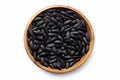 top view black sunflower seeds in a wooden bowl on a white background, created by Generative AI Royalty Free Stock Photo