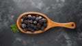 Top View Of Blackberries In Wooden Spoon On Gray Table