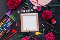 Top view blank Canvas with Create message on the Artist Workspace with pink peony flowers and variety of drawing Royalty Free Stock Photo