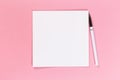 Top view of blank open notebook on pink background, concept of education or new workplace Royalty Free Stock Photo