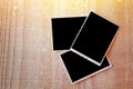 Top view of blank photos frame on wooden background Royalty Free Stock Photo