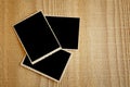 Top view of blank photos frame on wooden background Royalty Free Stock Photo