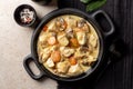 Top view of Blanquette de poulet, is a French chicken stew with carrots, mushrooms, onion. Simmered in a white stock and served in Royalty Free Stock Photo