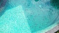 Top View of Blue and bright ripple water and surface in swimming pool, Beautiful motion gentle wave in pool Royalty Free Stock Photo