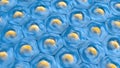 Top view on blue cell pattern with yellow cell nucleus Royalty Free Stock Photo