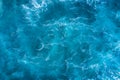 Top view of blue frothy sea surface. Shot in the open sea from above Royalty Free Stock Photo