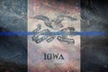 Top view of blue line flag of Iowa state, Usa. United states of America police flag. retro flag with grunge texture. no flagpole.