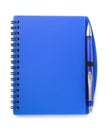 Top view of blue notebook and pen
