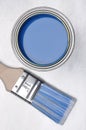 Top view of blue paint can with brush Royalty Free Stock Photo