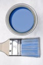 Top view of blue paint can with brush Royalty Free Stock Photo