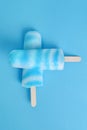 Top view blue raspberry and vanilla popsicle