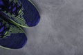 Top view blue running shoes on concrete background . Morning run concept . .Jogging, running, fitness, cross fit idea . opy space Royalty Free Stock Photo