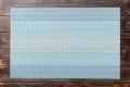 Top view of blue tablecloth for food on wooden background. Empty space for your design Royalty Free Stock Photo