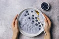 Top view of blue yogurt smoothie bowl made with blueberry Royalty Free Stock Photo