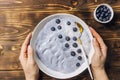 Top view of blue yogurt smoothie bowl made with blueberry Royalty Free Stock Photo